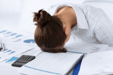 picture of woman sleeping at work